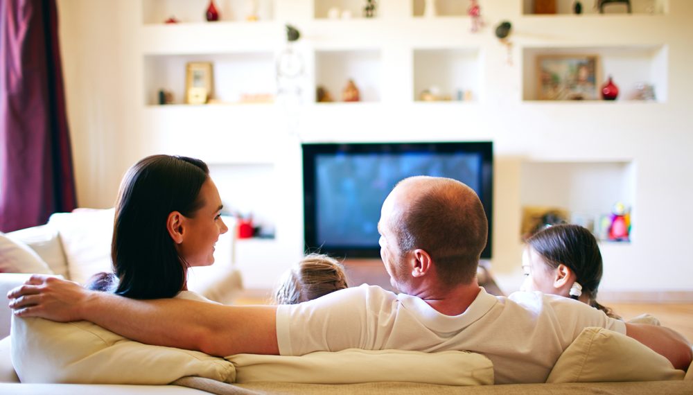 Guest entertainment -streaming Family relaxin a hotel room with streaming enetertainment